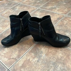 Black leather UGG wedge booties. Still in great condition.